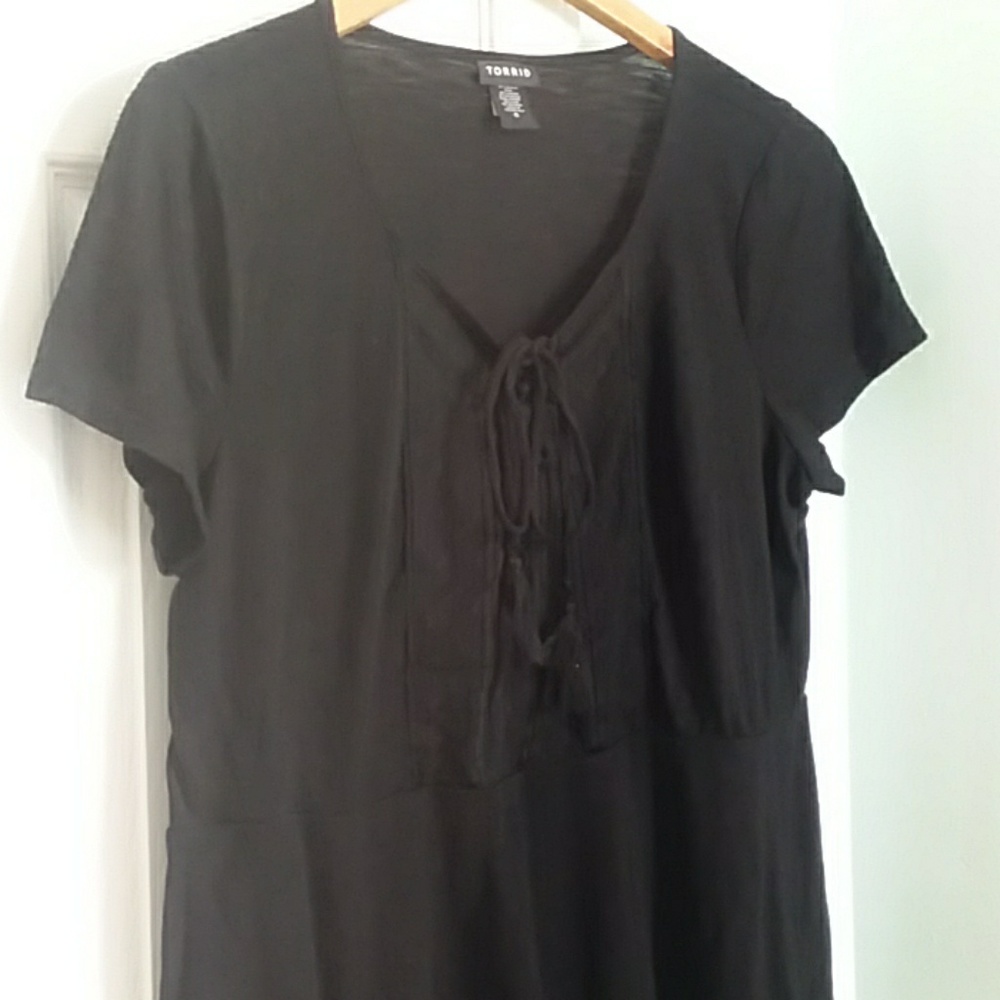 Torrid black peplum top w/ embroidery and tassels